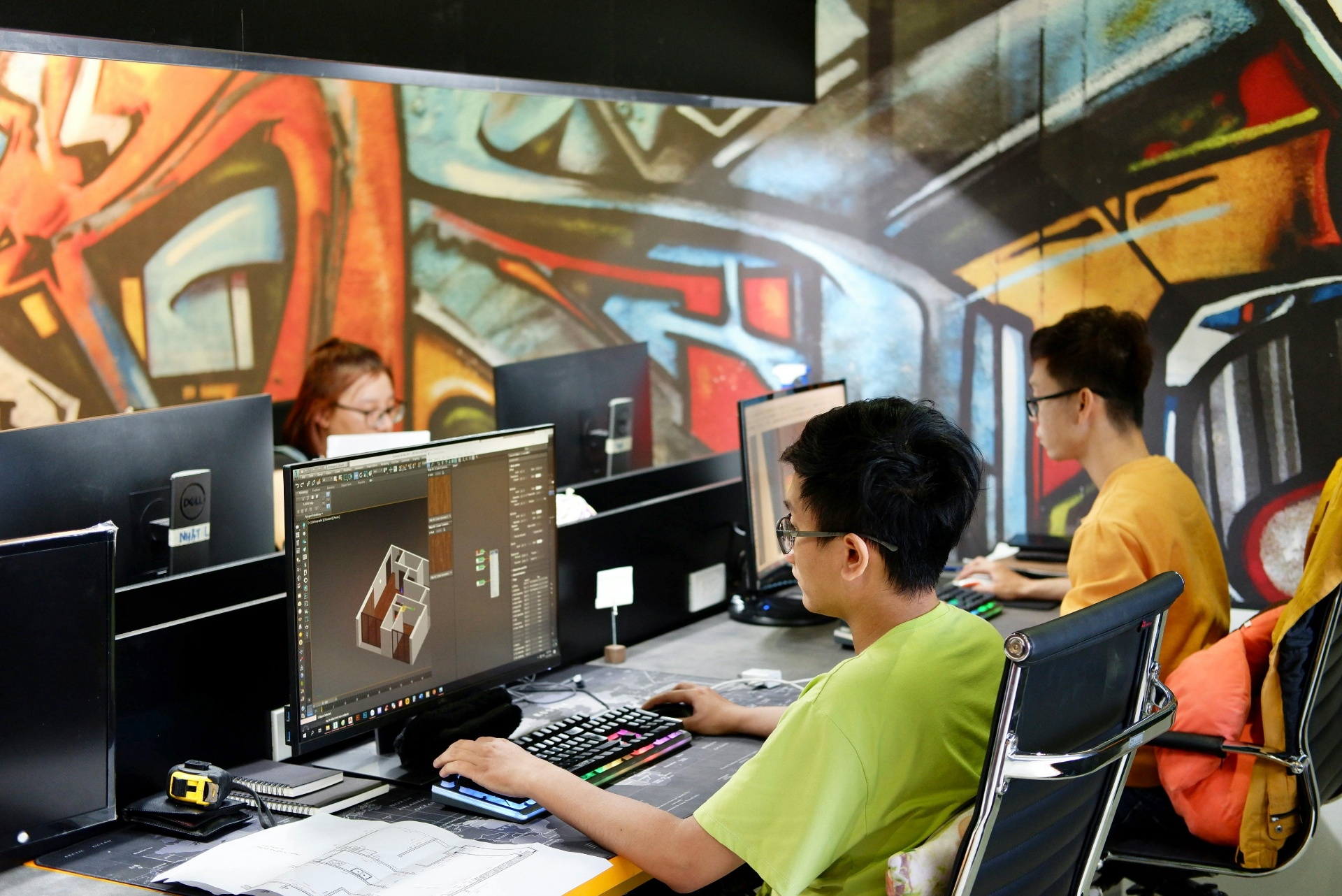 Game developers at work in a Southeast Asian studio